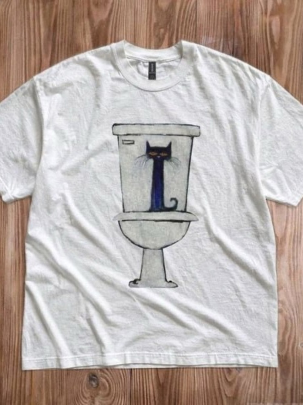 White a Pete the cat standing inside a toilet T shirt